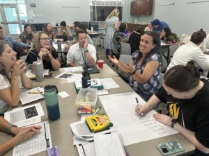Oldham County Teachers working together at a table
